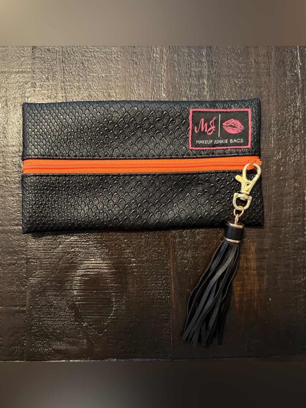 Makeup Junkie- Mini Black Cosmetic Clutch with Orange Zip and Tassel